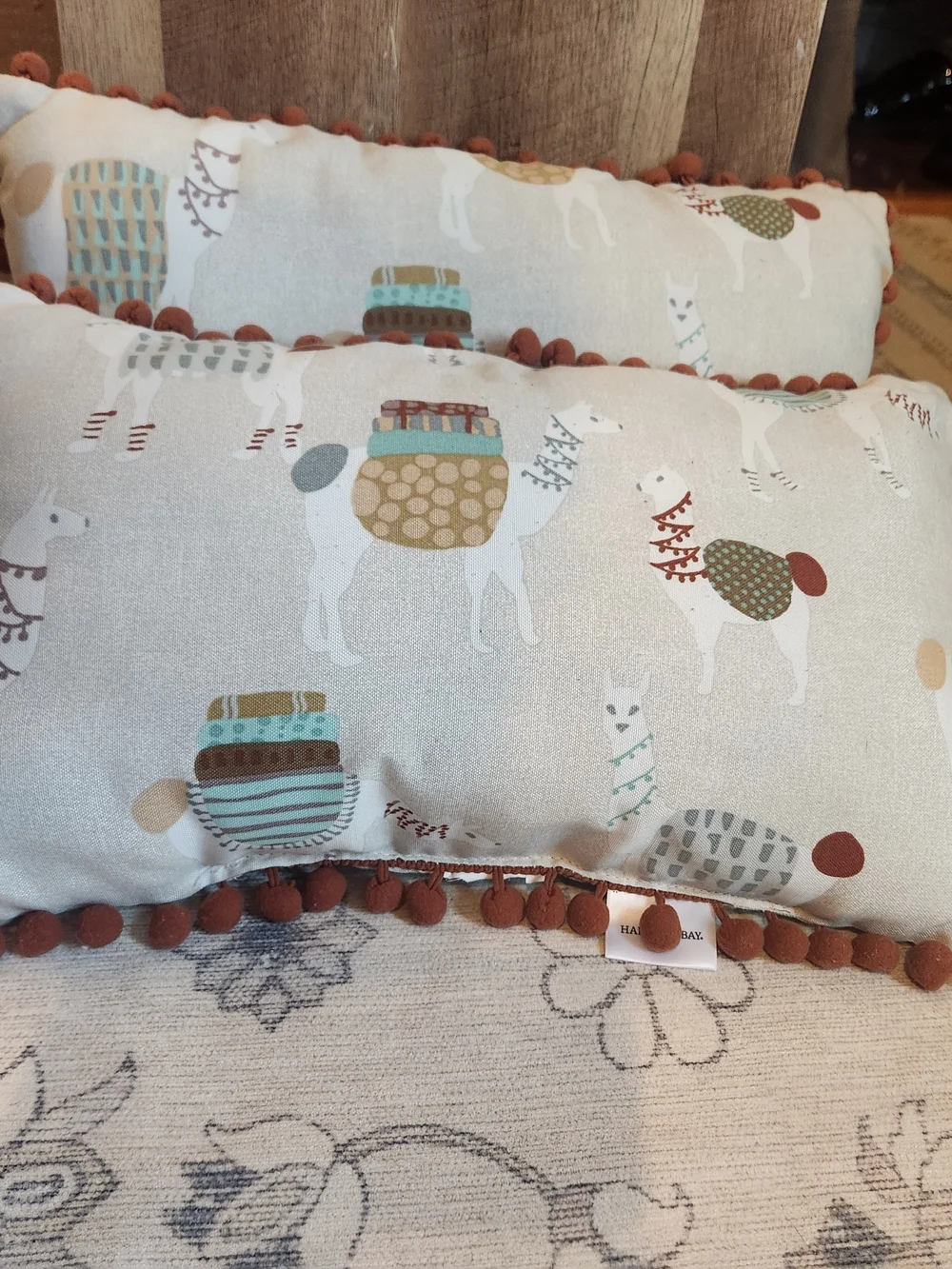 Handmade Llama Accent Pillow in Cream with Rust Pom Trim